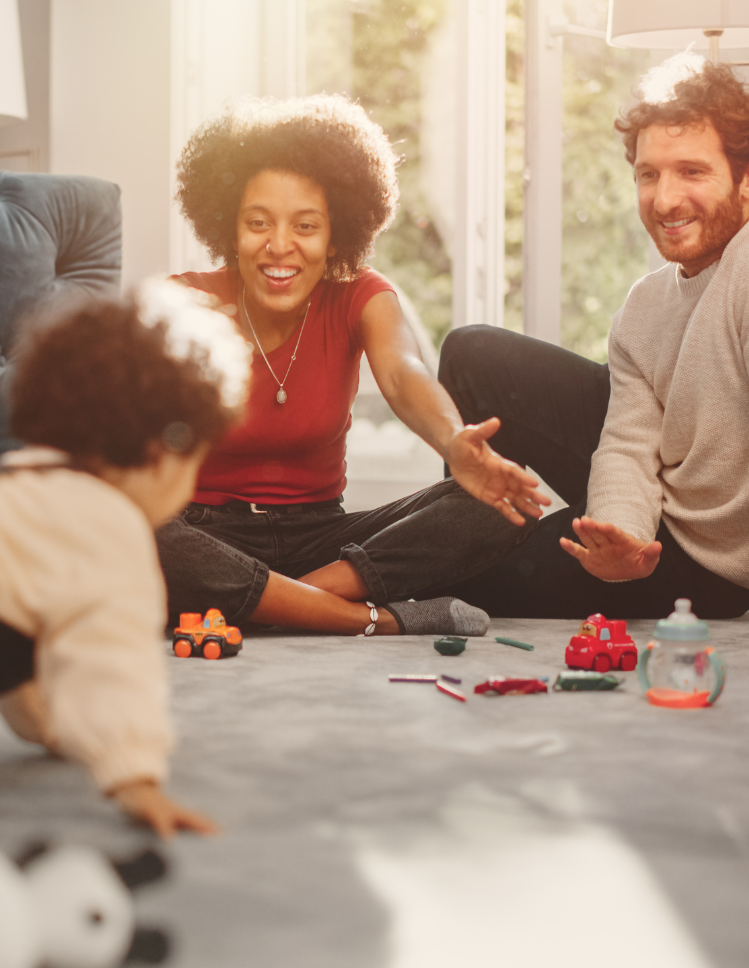 family playing on carpet