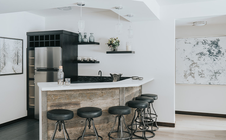 Basement bar interior design by Big Sky ReDesign Photography by Justin Jane Photography